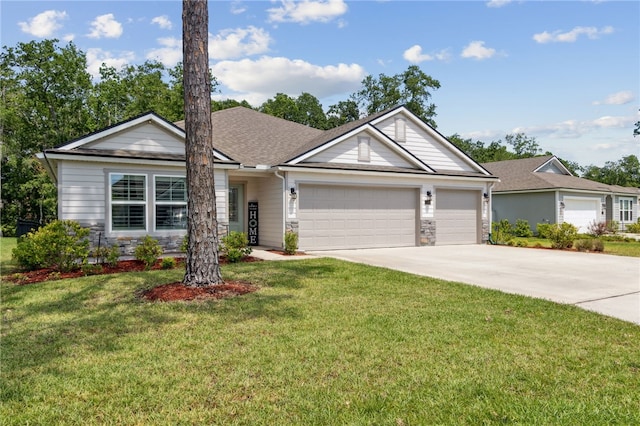 129 Chinquapin Dr, Saint Marys, GA 31558 - single story home featuring an attached garage, driveway, a front yard, and roof with shingles