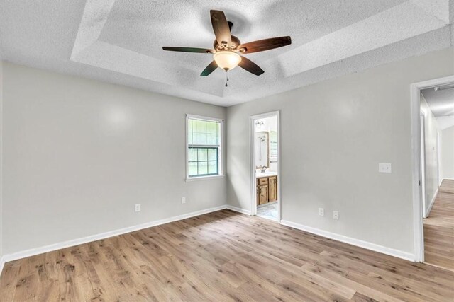 122 Tyson Ln, Allenhurst, GA 31301 - spare room featuring attic access, a ceiling fan, wood finished floors, and a textured ceiling