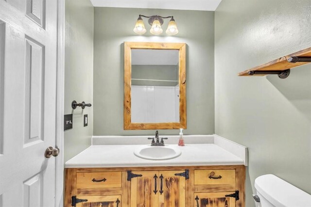 122 Tyson Ln, Allenhurst, GA 31301 - half bathroom featuring toilet and vanity
