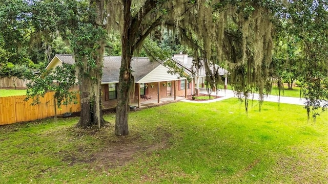 122 Tyson Ln, Allenhurst, GA 31301 - view of yard with a porch
