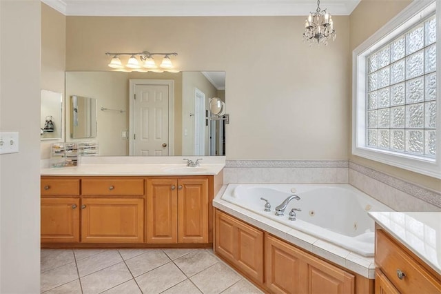 bathroom with tile patterned flooring, a chandelier, a bathtub, vanity, and ornamental molding