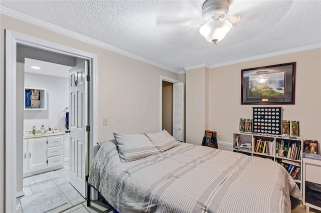 tiled bedroom with crown molding, ceiling fan, sink, and a textured ceiling