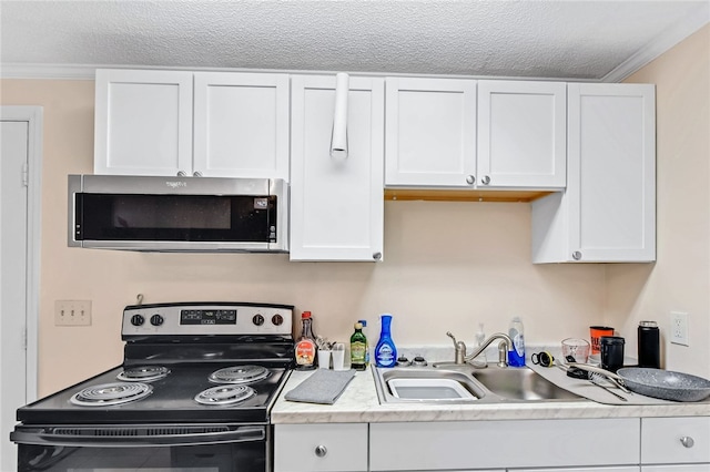 kitchen with white cabinets, ornamental molding, sink, and electric range