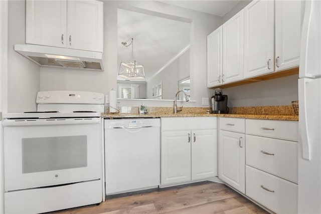 kitchen with white cabinetry, white appliances, stone countertops, and light wood-type flooring