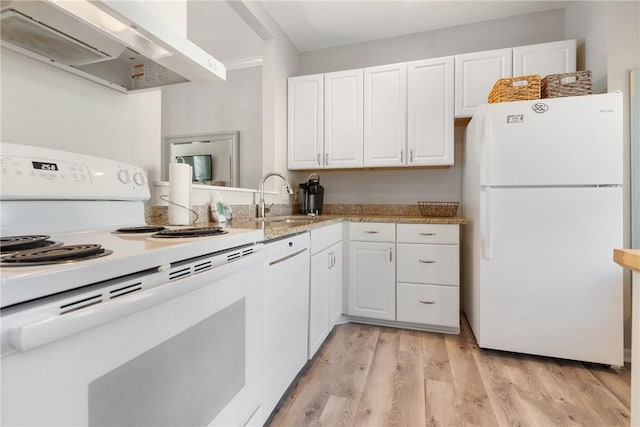 kitchen featuring white cabinetry, sink, light hardwood / wood-style floors, white appliances, and wall chimney exhaust hood