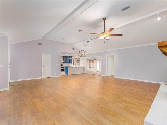 unfurnished living room featuring ceiling fan with notable chandelier, light hardwood / wood-style flooring, vaulted ceiling with beams, and crown molding