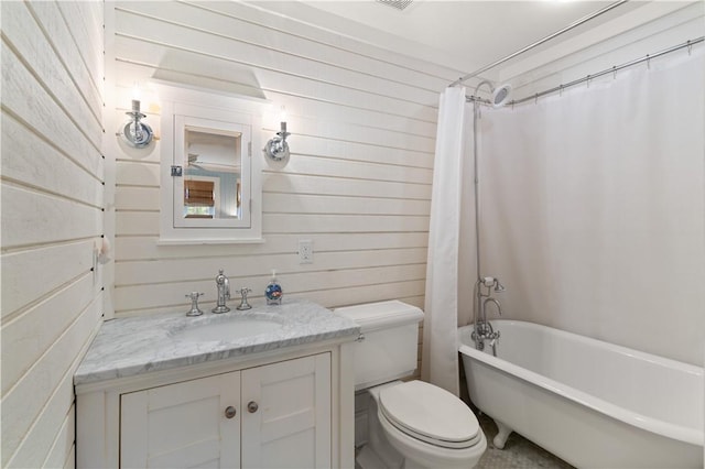 full bathroom with shower / bath combination with curtain, vanity, toilet, and wood walls