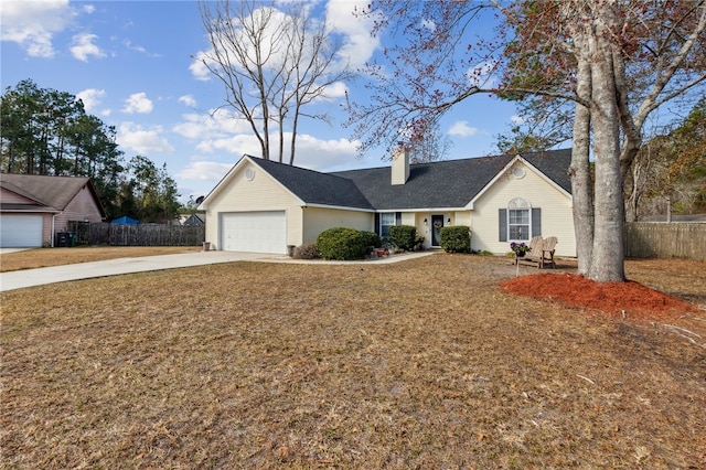 single story home with a garage and a front yard