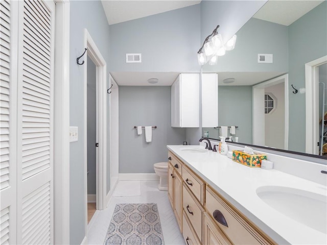 full bathroom with visible vents, a closet, and a sink