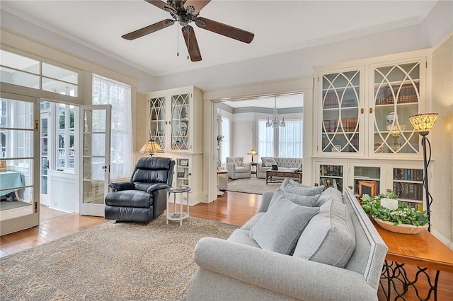1000 Union St, Brunswick, GA 31520 - living area with ornamental molding, plenty of natural light, ceiling fan, and wood finished floors