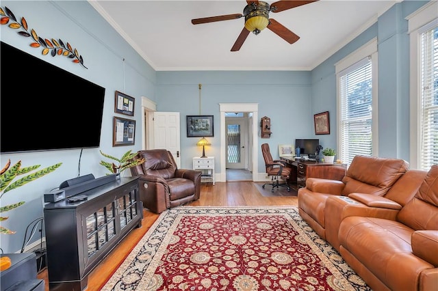 1000 Union St, Brunswick, GA 31520 - living room featuring a desk, ceiling fan, light wood finished floors, and crown molding