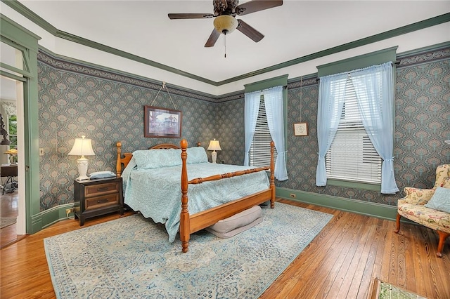 1000 Union St, Brunswick, GA 31520 - bedroom with crown molding, wood-type flooring, wallpapered walls, and ceiling fan