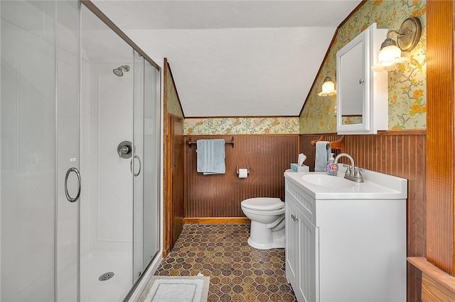 1000 Union St, Brunswick, GA 31520 - bathroom featuring wallpapered walls, wainscoting, vanity, and a stall shower