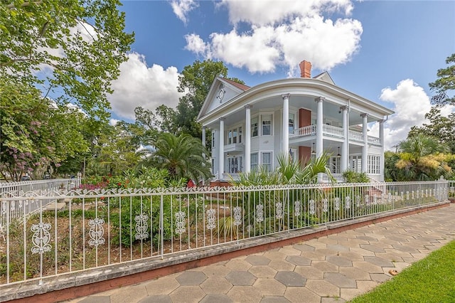 1000 Union St, Brunswick, GA 31520 - greek revival house with covered porch and a chimney
