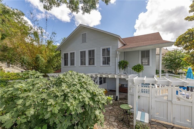 1000 Union St, Brunswick, GA 31520 - back of property with a gate and a shingled roof