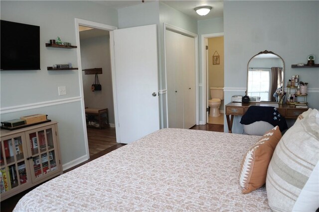 102 Avalon Ct, Kingsland, GA 31548 - bedroom featuring wood finished floors, ensuite bathroom, and a closet