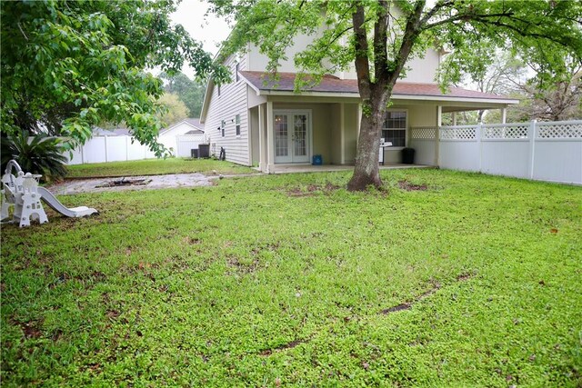 102 Avalon Ct, Kingsland, GA 31548 - rear view of house with french doors