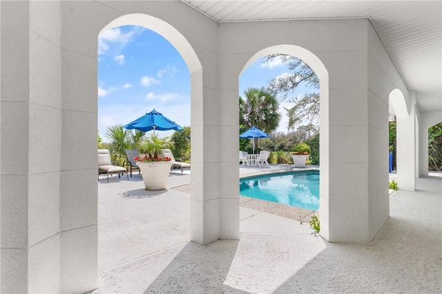 pool featuring a patio