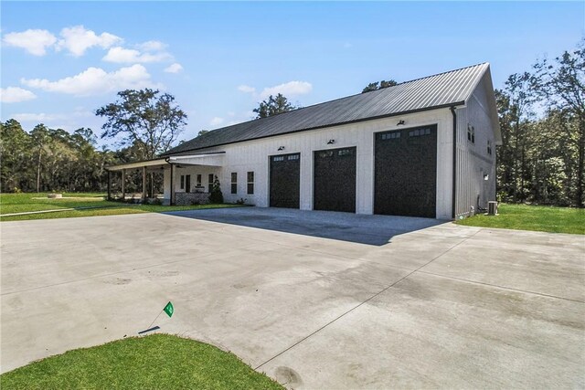 garage with a lawn