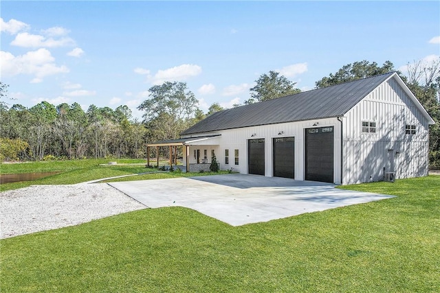 garage featuring a yard