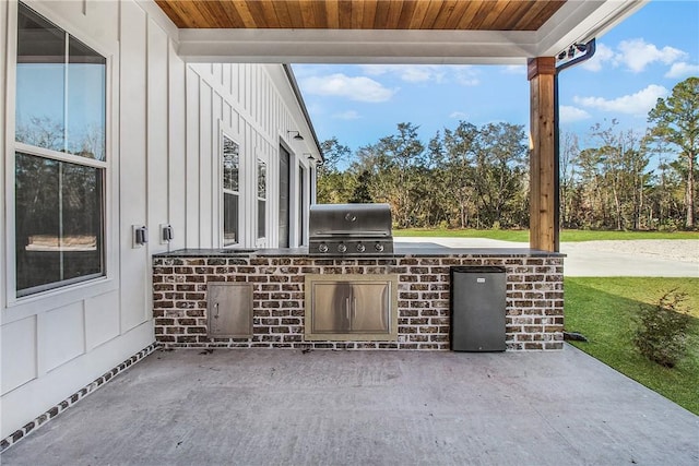 view of patio / terrace featuring exterior kitchen and area for grilling