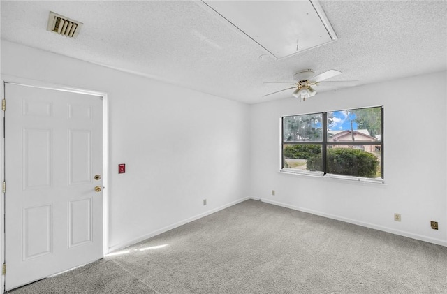 311 Sunnyside Dr, Saint Marys, GA 31558 - empty room featuring attic access, carpet flooring, a textured ceiling, ceiling fan, and baseboards
