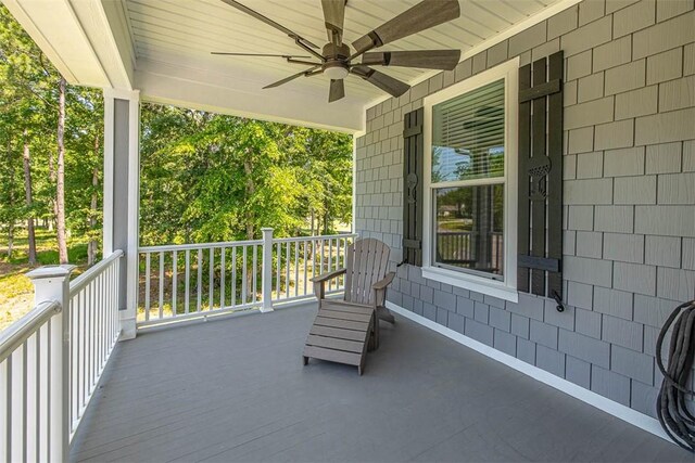 view of patio with a porch and ceiling fan