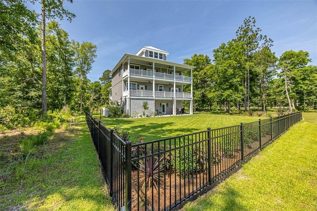 exterior space with a yard and a balcony