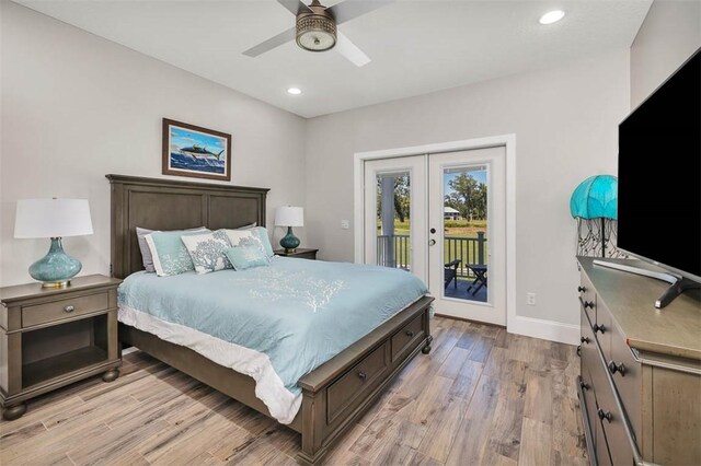 bedroom with access to exterior, ceiling fan, light hardwood / wood-style flooring, and french doors