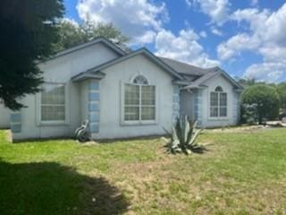 3042 Charing Cross Cross, Brunswick, GA 31525 - back of house with a lawn