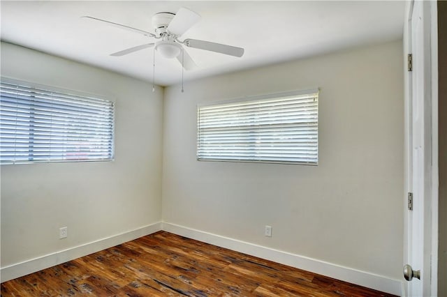 828 Lee St, Brunswick, GA 31520 - spare room featuring a ceiling fan and dark wood-style flooring