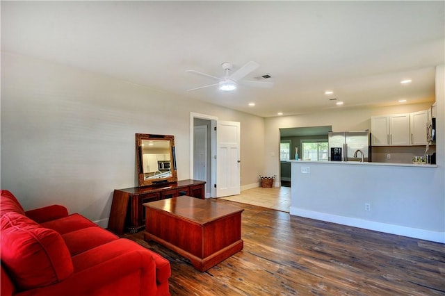 828 Lee St, Brunswick, GA 31520 - living area featuring ceiling fan, wood finished floors, and recessed lighting
