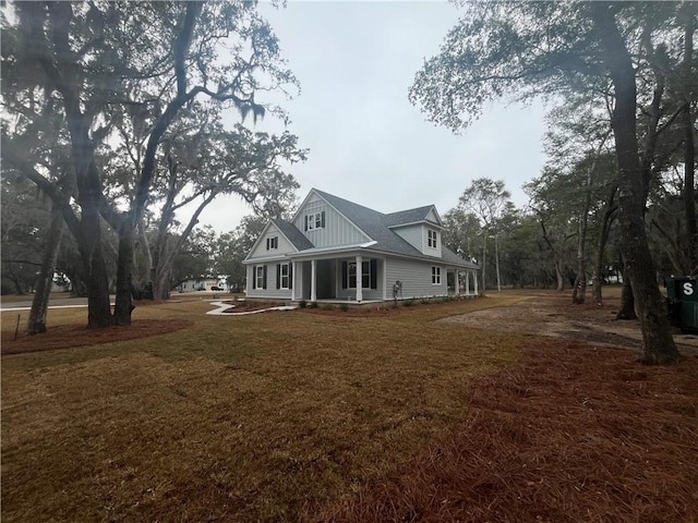 view of property exterior featuring a yard