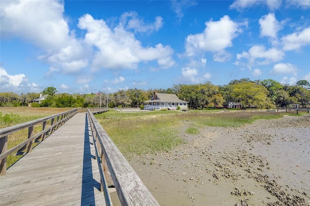 view of dock featuring a rural view