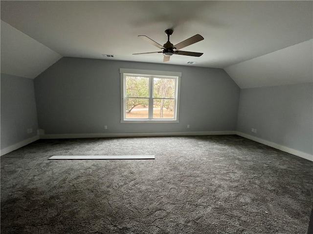 additional living space featuring vaulted ceiling, ceiling fan, and carpet