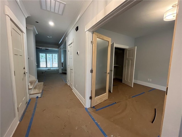 hallway with crown molding