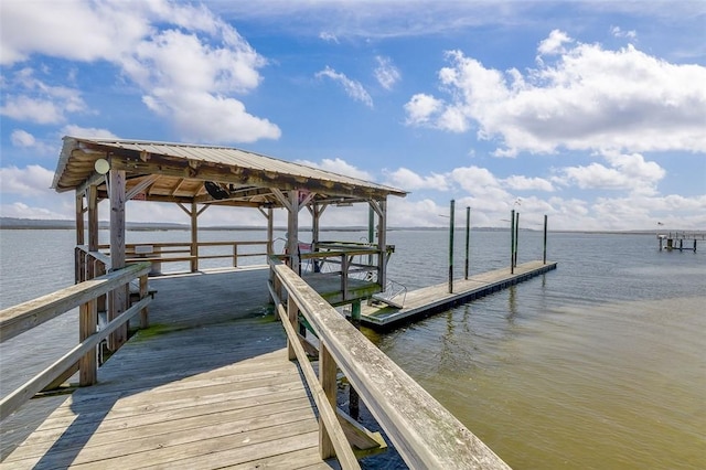 view of dock featuring a water view