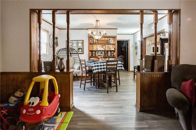 1405 Grove Ave, Waycross, GA 31501 - dining space featuring wood finished floors and a chandelier
