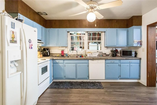 1405 Grove Ave, Waycross, GA 31501 - kitchen with white appliances, blue cabinetry, a sink, dark wood finished floors, and a ceiling fan