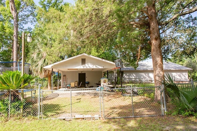1405 Grove Ave, Waycross, GA 31501 - rear view of property featuring a gate