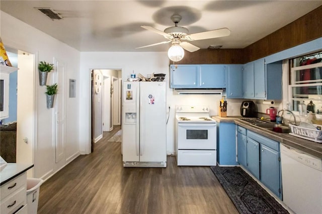 1405 Grove Ave, Waycross, GA 31501 - kitchen with blue cabinets, white appliances, a sink, exhaust hood, and dark wood-style flooring