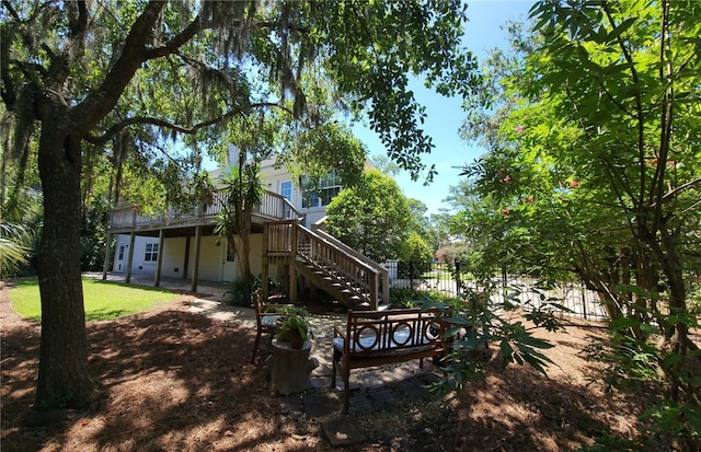 412 Palm Dr, Saint Simons Island, GA 31522 - back of property featuring stairway