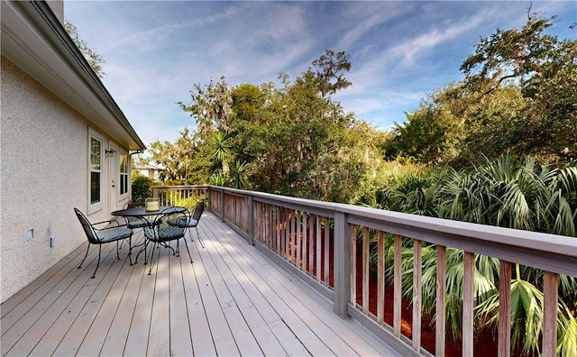 412 Palm Dr, Saint Simons Island, GA 31522 - wooden terrace with outdoor dining space