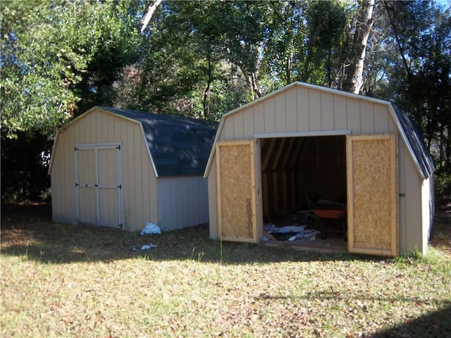 view of outdoor structure with a lawn