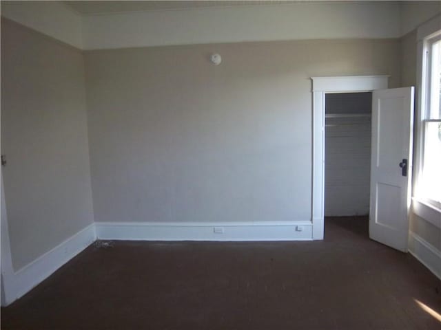 unfurnished bedroom featuring a closet