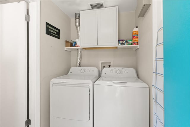 127 Landover Dr, Brunswick, GA 31525 - laundry area with washer and dryer and cabinet space