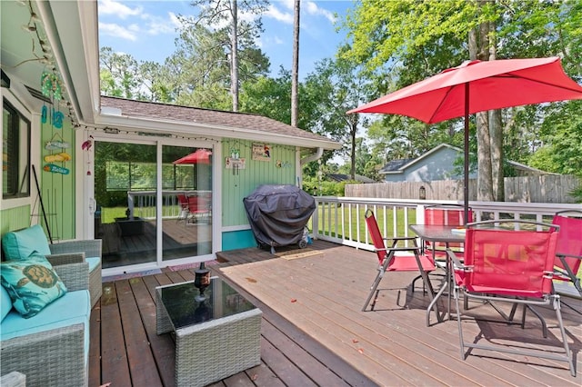 127 Landover Dr, Brunswick, GA 31525 - wooden terrace featuring outdoor dining space, fence, and area for grilling