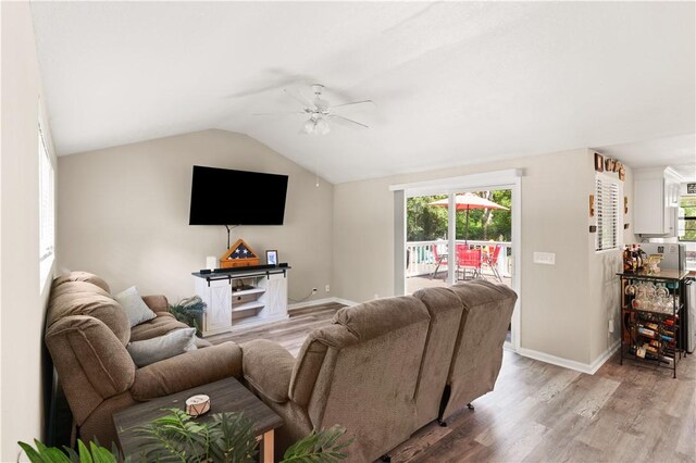 127 Landover Dr, Brunswick, GA 31525 - living room featuring a ceiling fan, light wood finished floors, baseboards, and vaulted ceiling