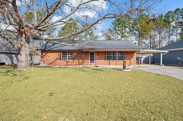 ranch-style house with a front lawn and a carport