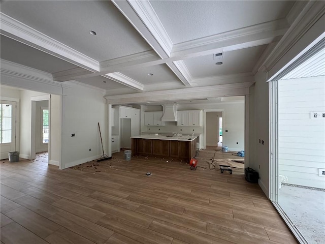 701 Broadwood Dr, Woodbine, GA 31569 - unfurnished living room with crown molding, wood finished floors, beam ceiling, and coffered ceiling